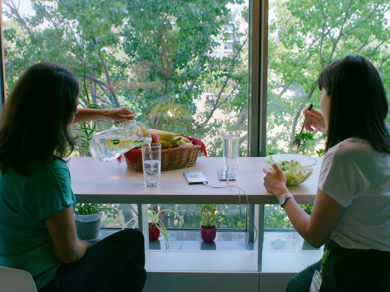 Two girls having lunchbreak