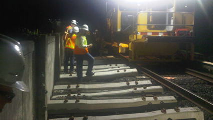Tren Urbano Workmen on Track